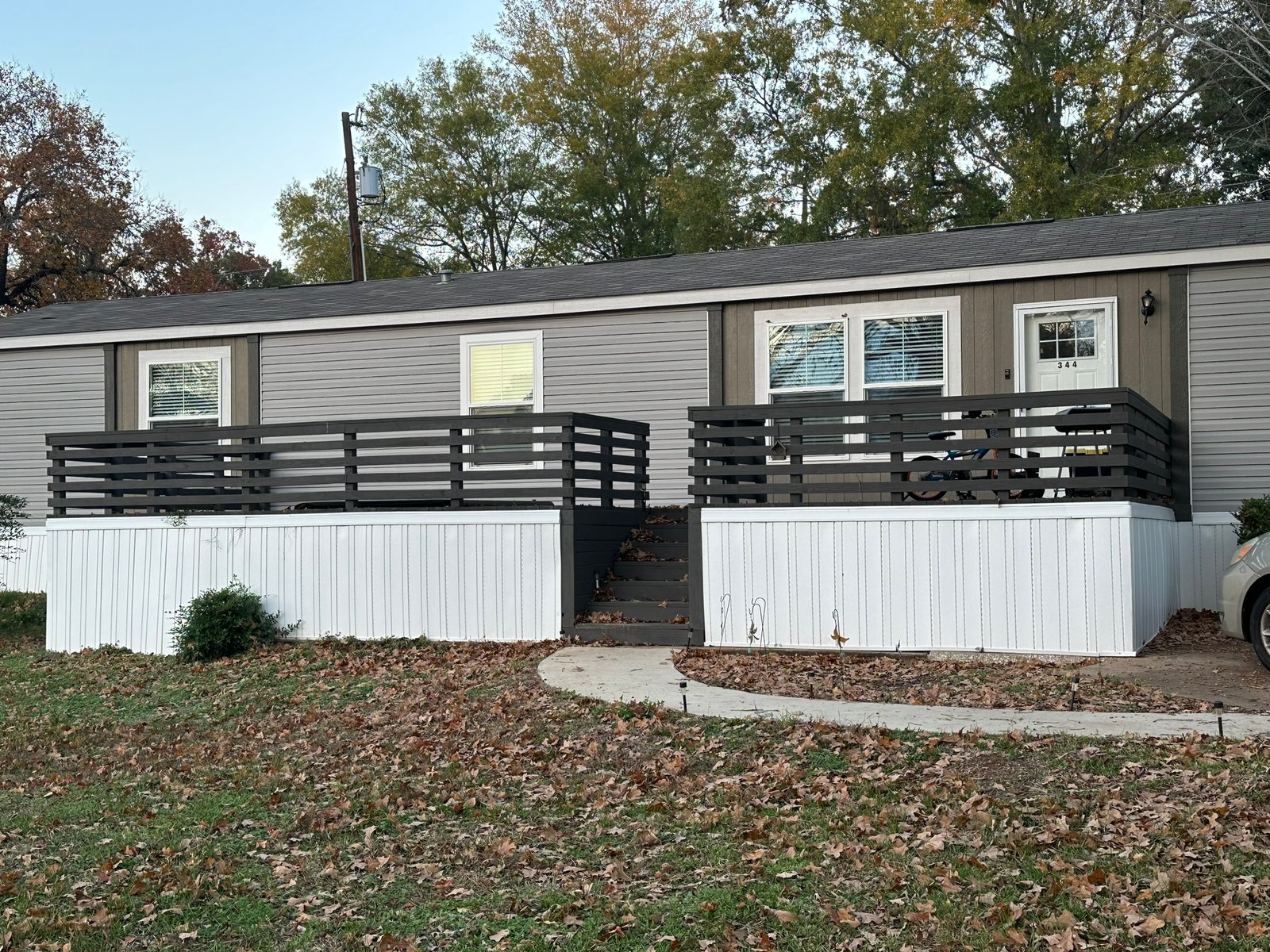 Newly built wood deck with slat railing on a North Texas home