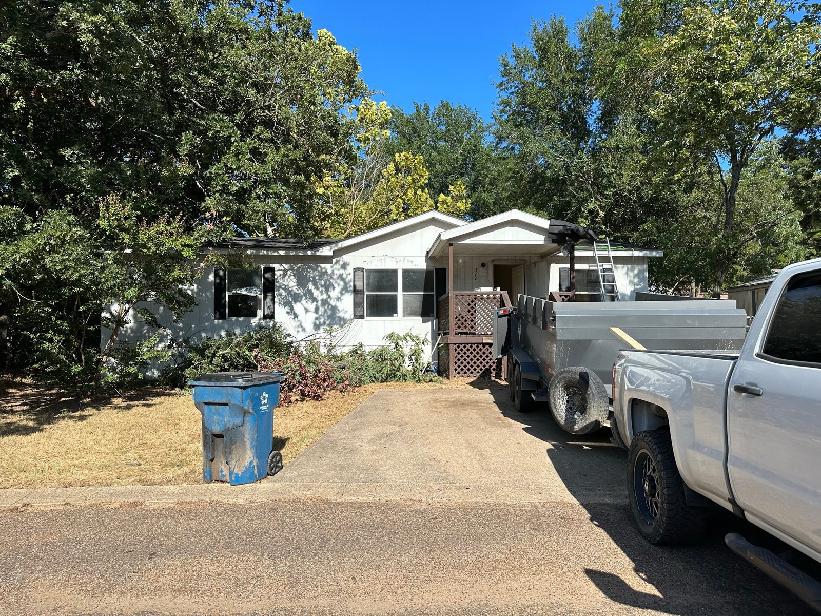Full exterior remodel getting started, work trailer on site